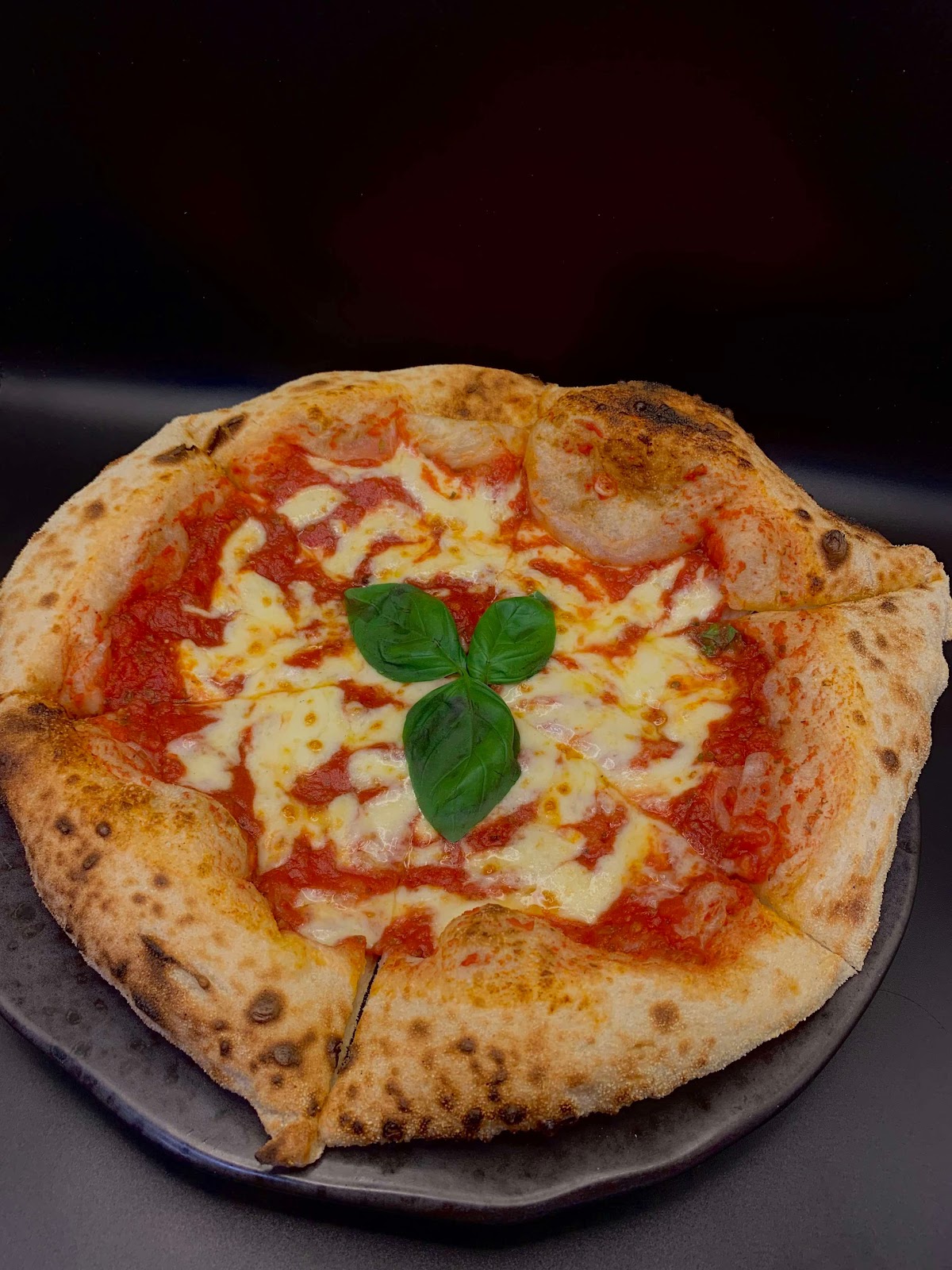 Wood-fired pizza at Levi's Pizzeria Burnley